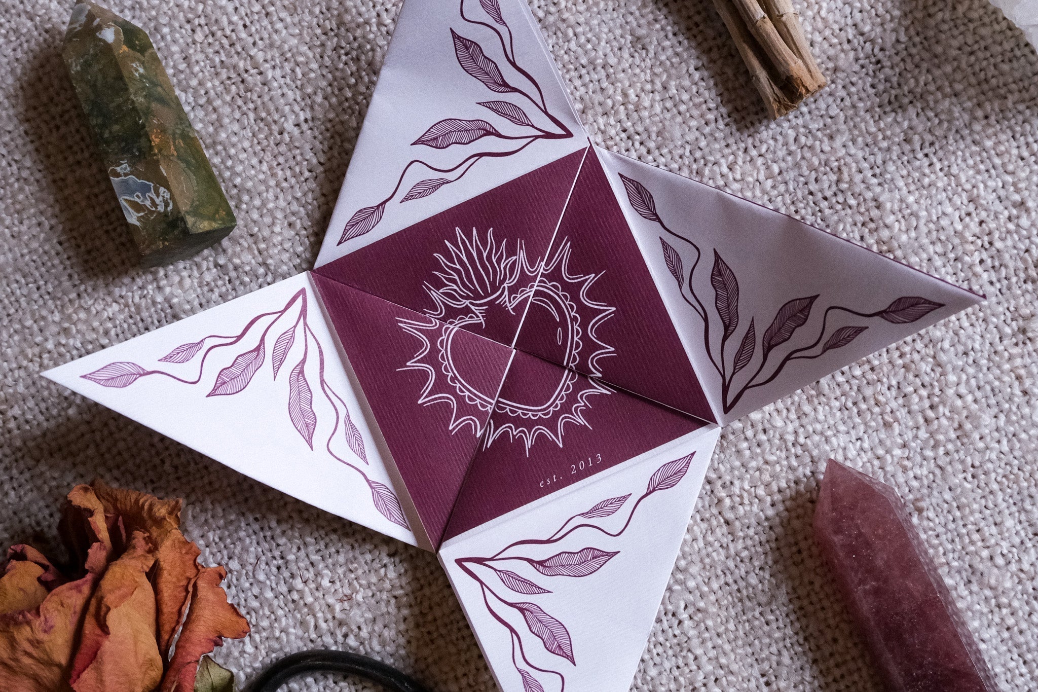Luxury vintage maroon and white folding wedding card with leaf motifs, flaming heart, romantic celestial details; UK personalised stationery.