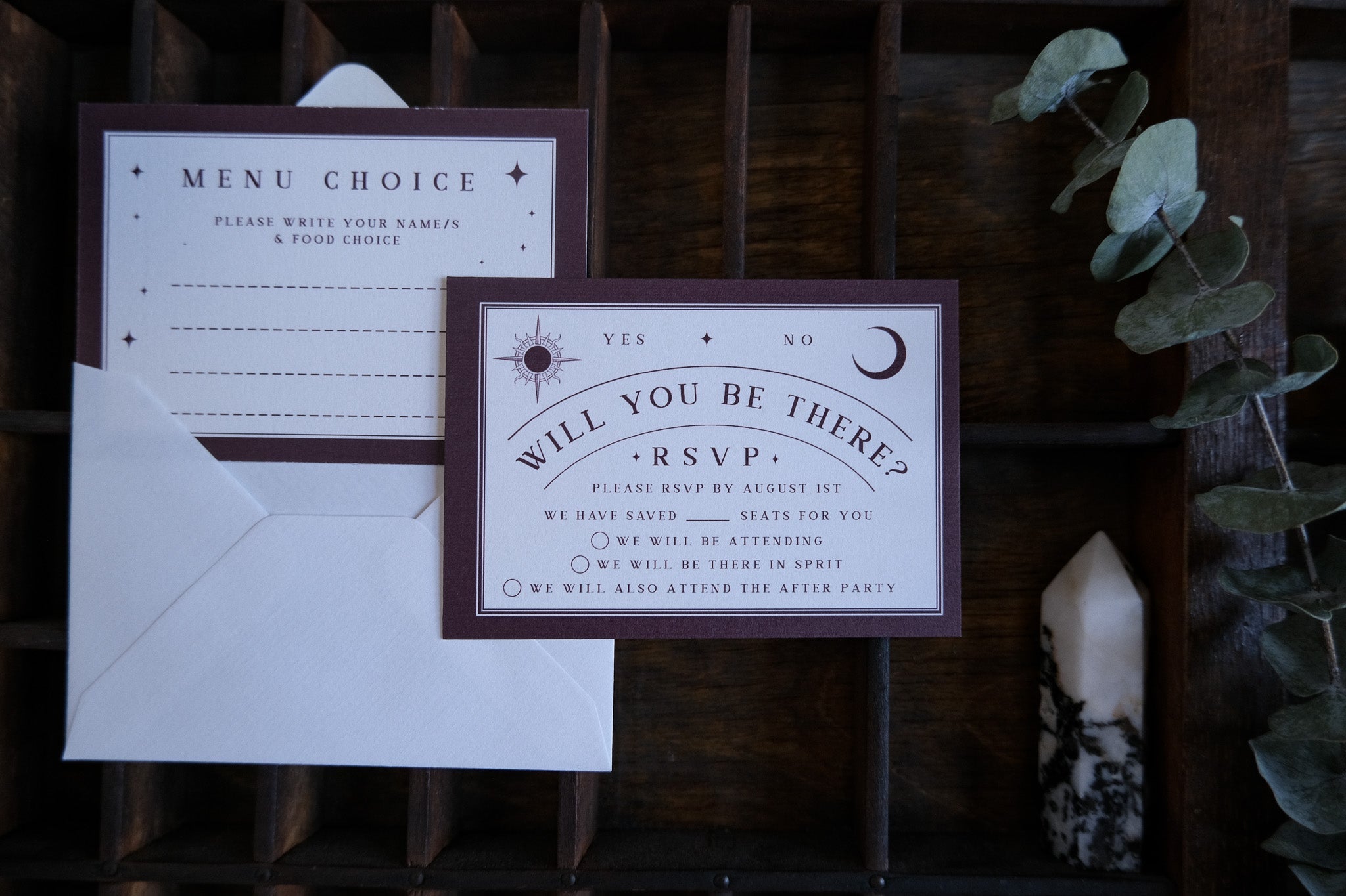 Luxury UK wedding stationery set featuring celestial purple and white designs, with mystical gothic details and elegant premium card stock.