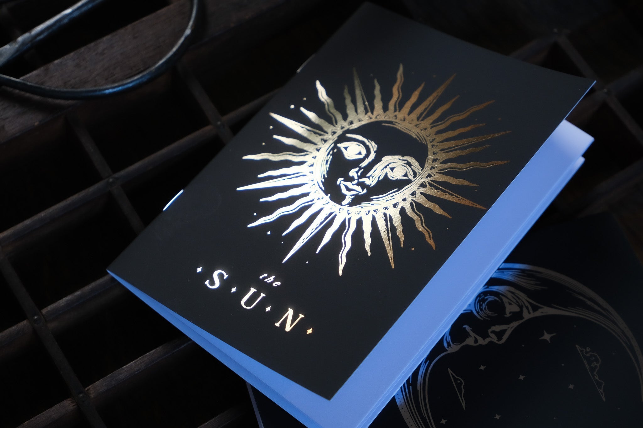Luxury UK vow books with celestial and gothic foil detailing, crafted on premium card—ideal for romantic, alternative weddings.