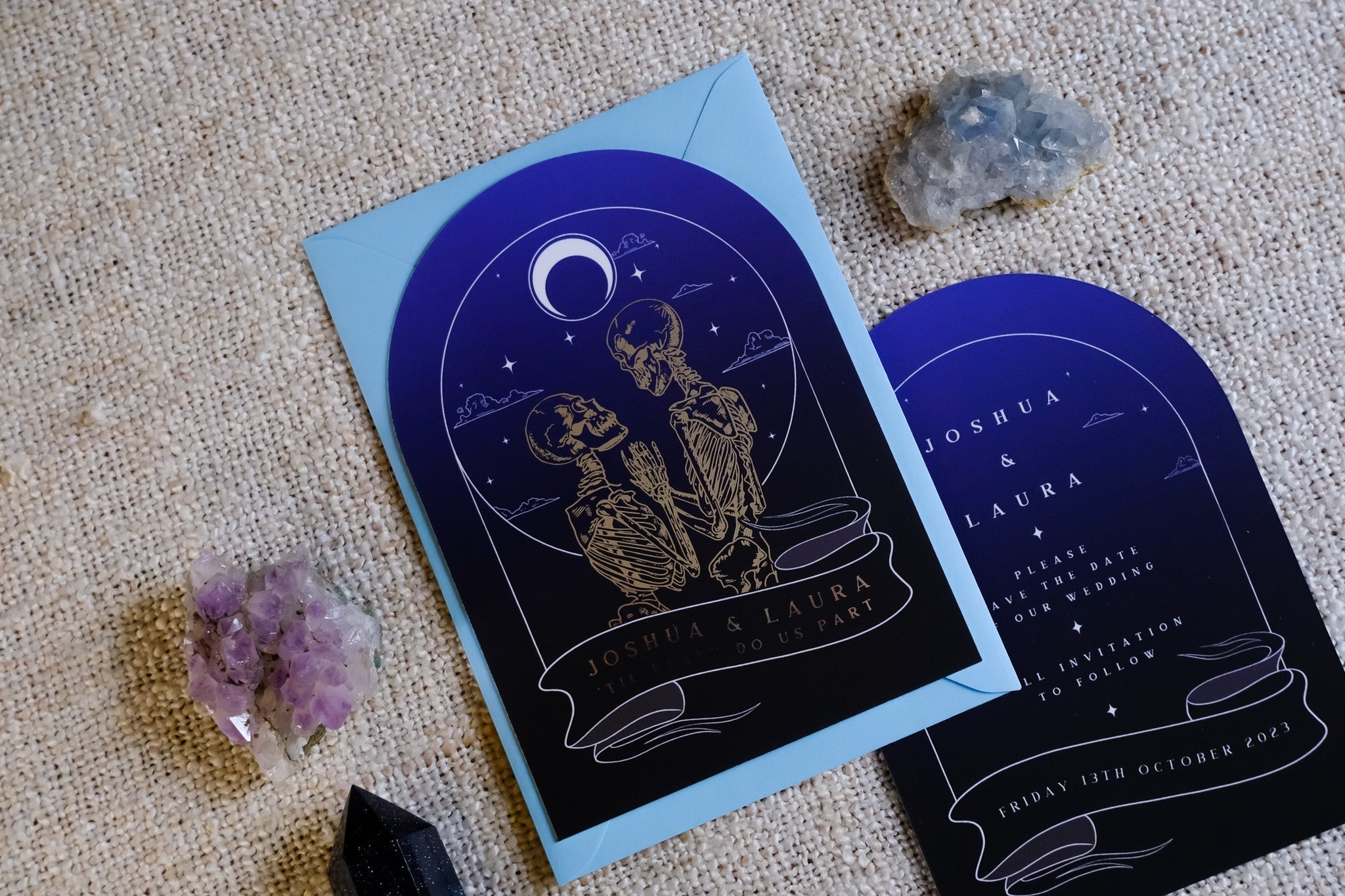 The Lovers Arched Foiled Save The Date card with skeleton couple and gothic design