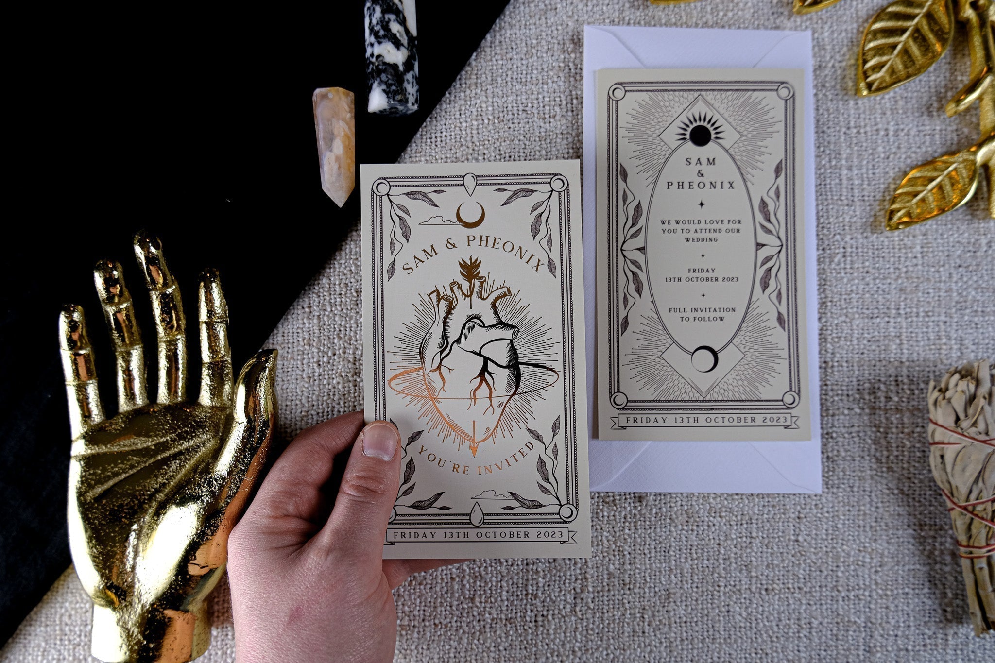 Gothic foiled bleeding heart save the date card with anatomical heart illustration on velvet soft-touch paper