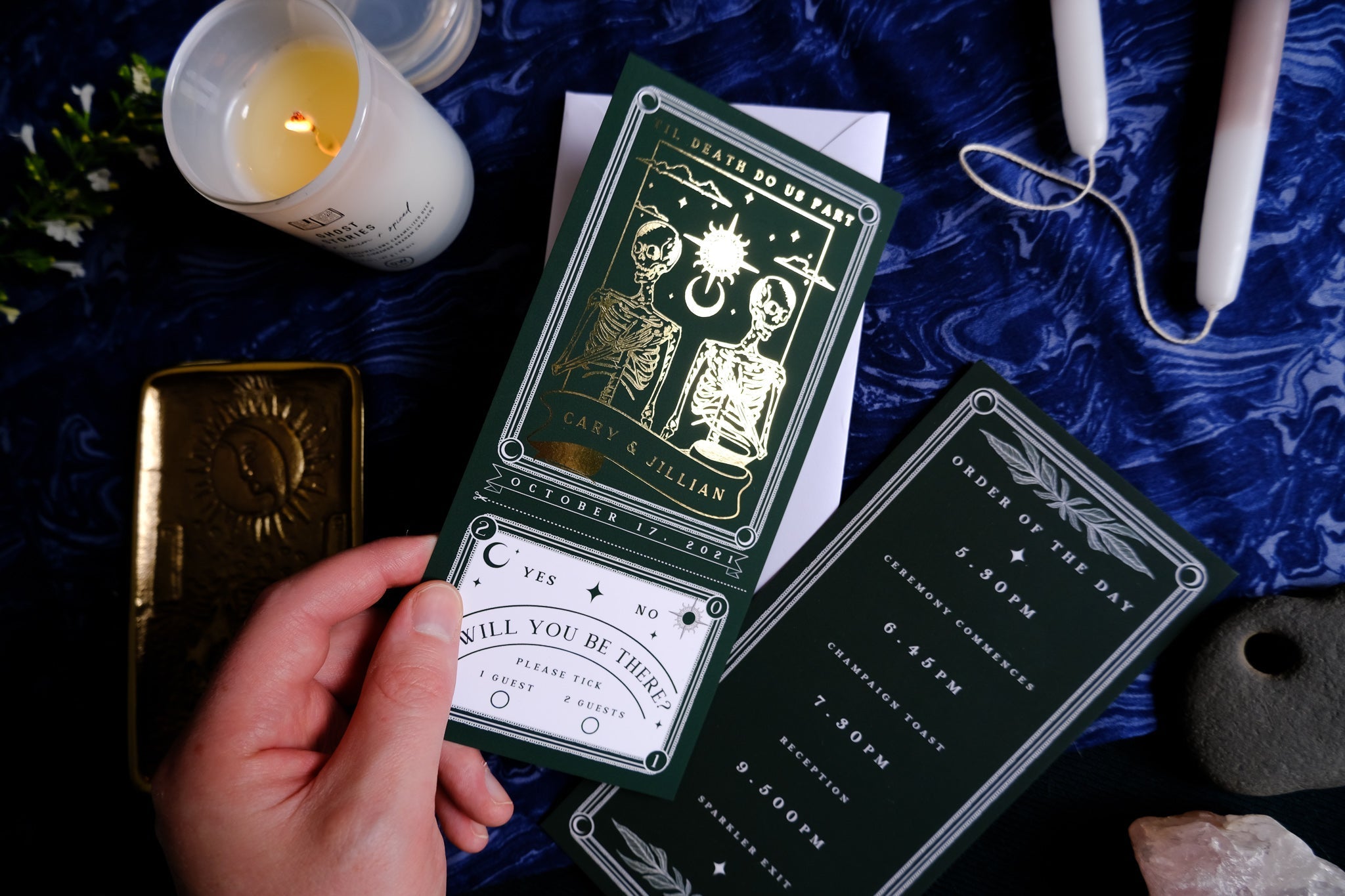 'Til Death Do Us Part' foiled tarot invitation and RSVP card set, featuring intricate design with white envelope, photographed by Clare Gelderd.