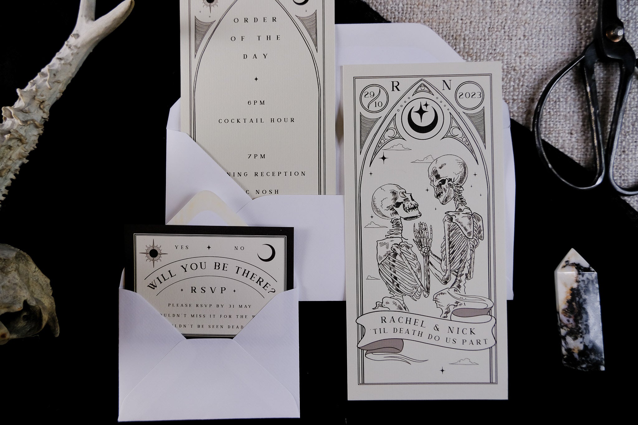 'Til Death Do Us Part' Lovers Tarot Card 3 Piece Invitation Suite featuring skeleton tarot card, order details, and RSVP card with white envelopes.