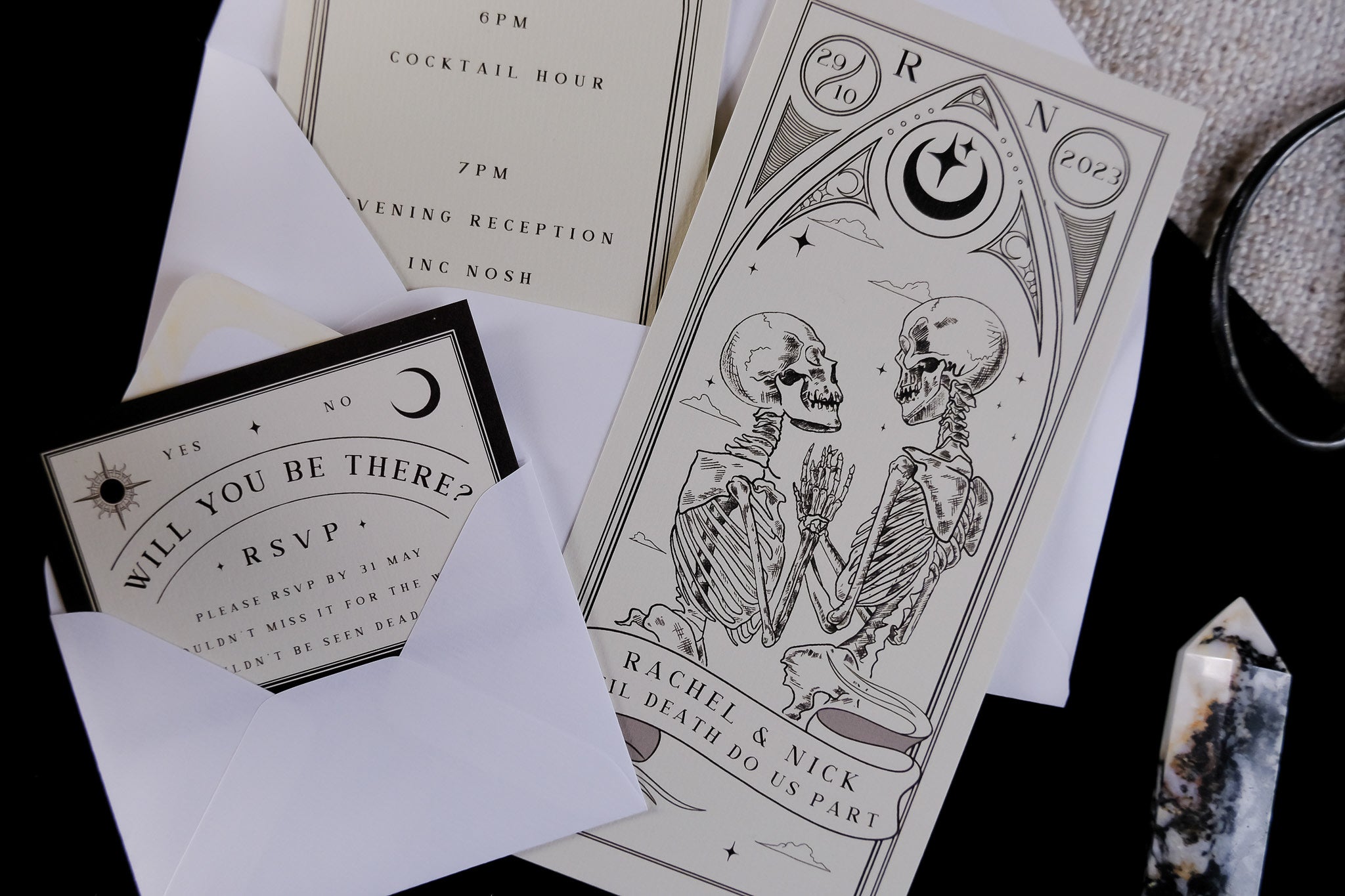'Til Death Do Us Part' Lovers Tarot Card 3 Piece Invitation Suite featuring skeleton tarot design, RSVP card, and order details in envelopes.