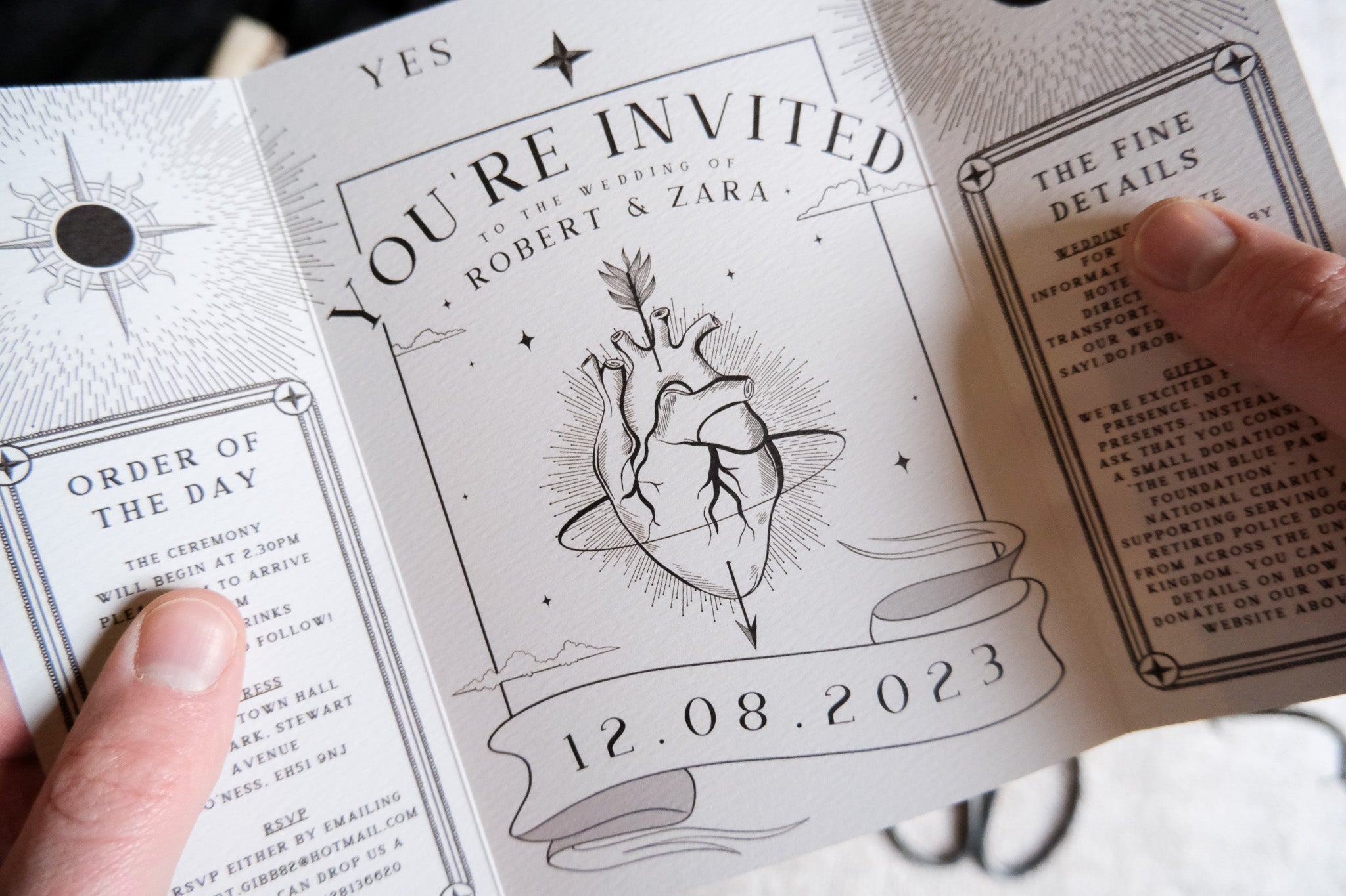 Skeleton Lovers & Bleeding Heart wedding invitation with artistic heart design, includes white envelopes, customizable colors, gatefold style.