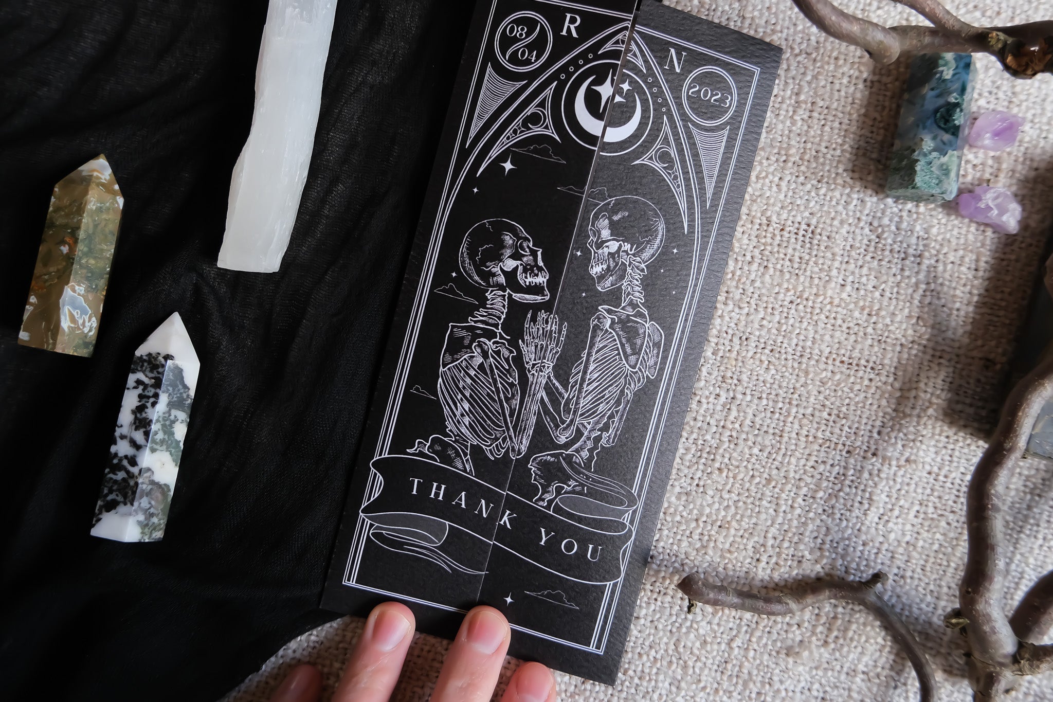 'Til Death Do Us Part' wedding thank you card with skeleton design and black envelope.