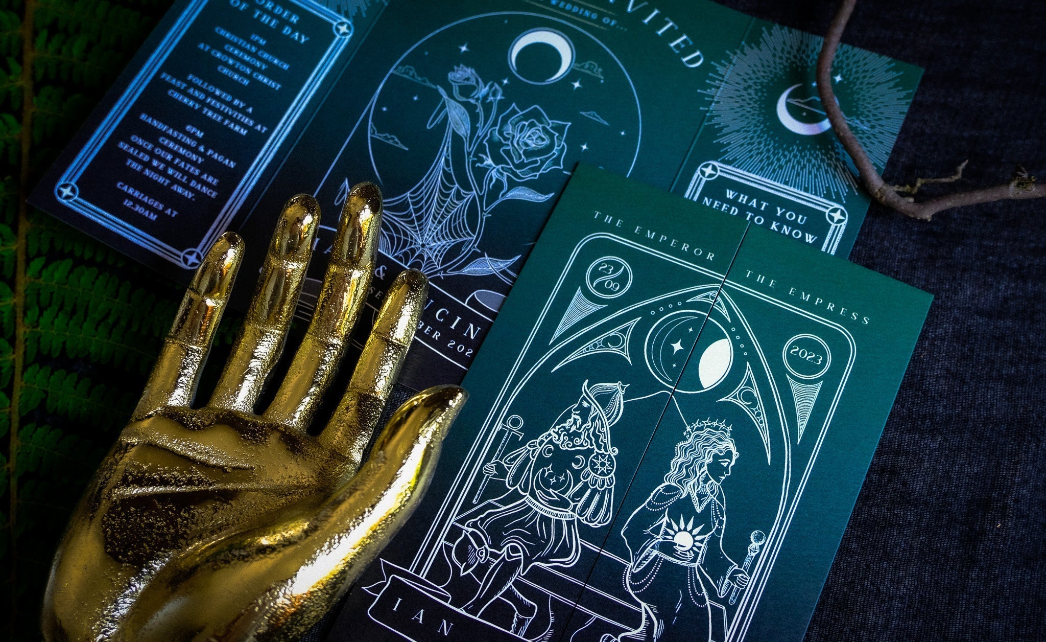 'Empress & Emperor' Tarot Style Gatefold Wedding Invitation with gold hand decoration.