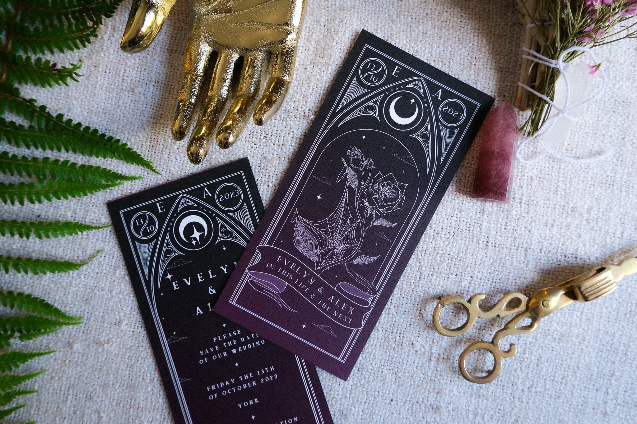 Black Rose Tarot Save The Date Card with gold decoration and envelope.