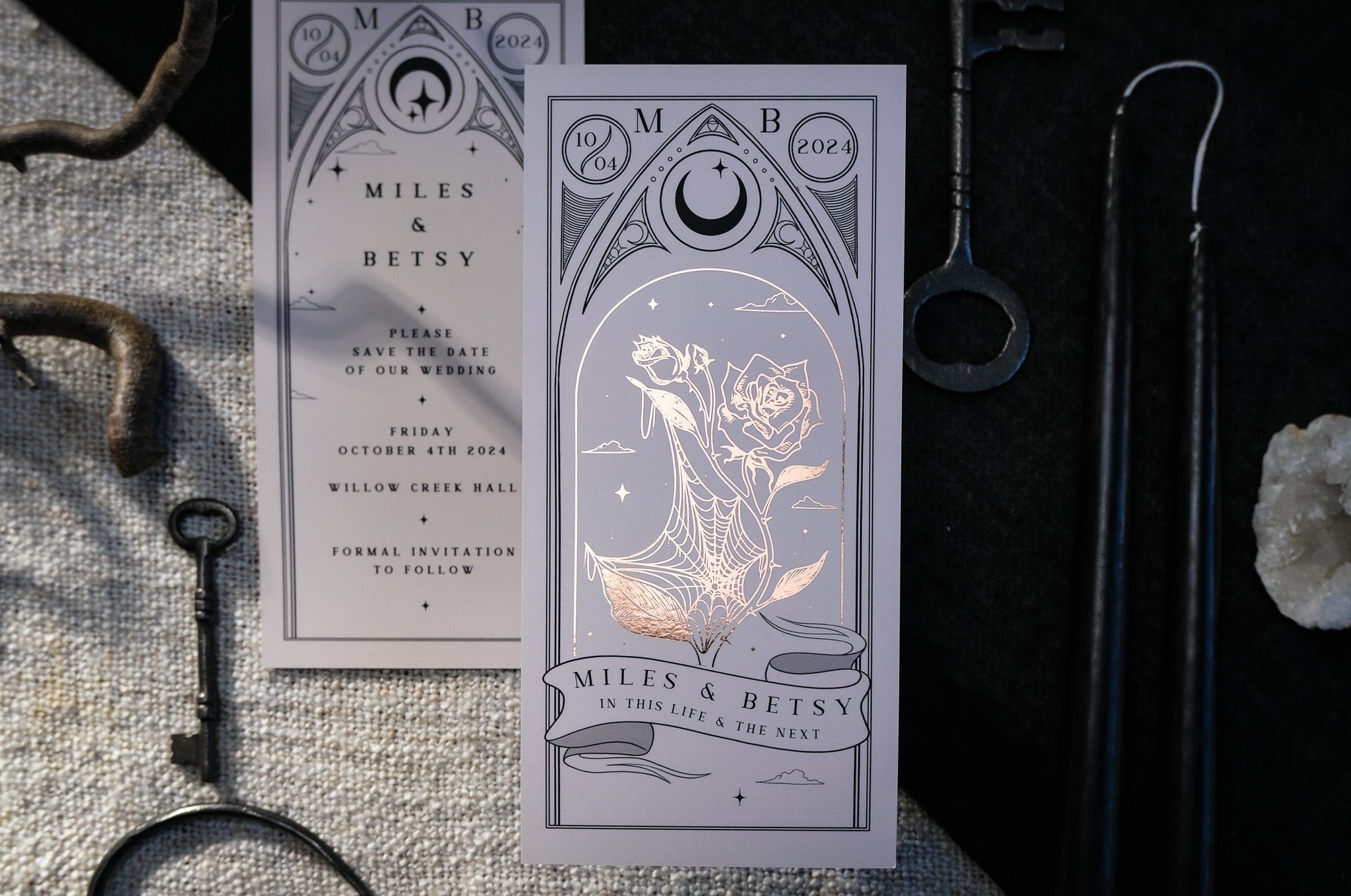 Foiled Rose Tarot Card Save The Date with intricate design and white envelopes.