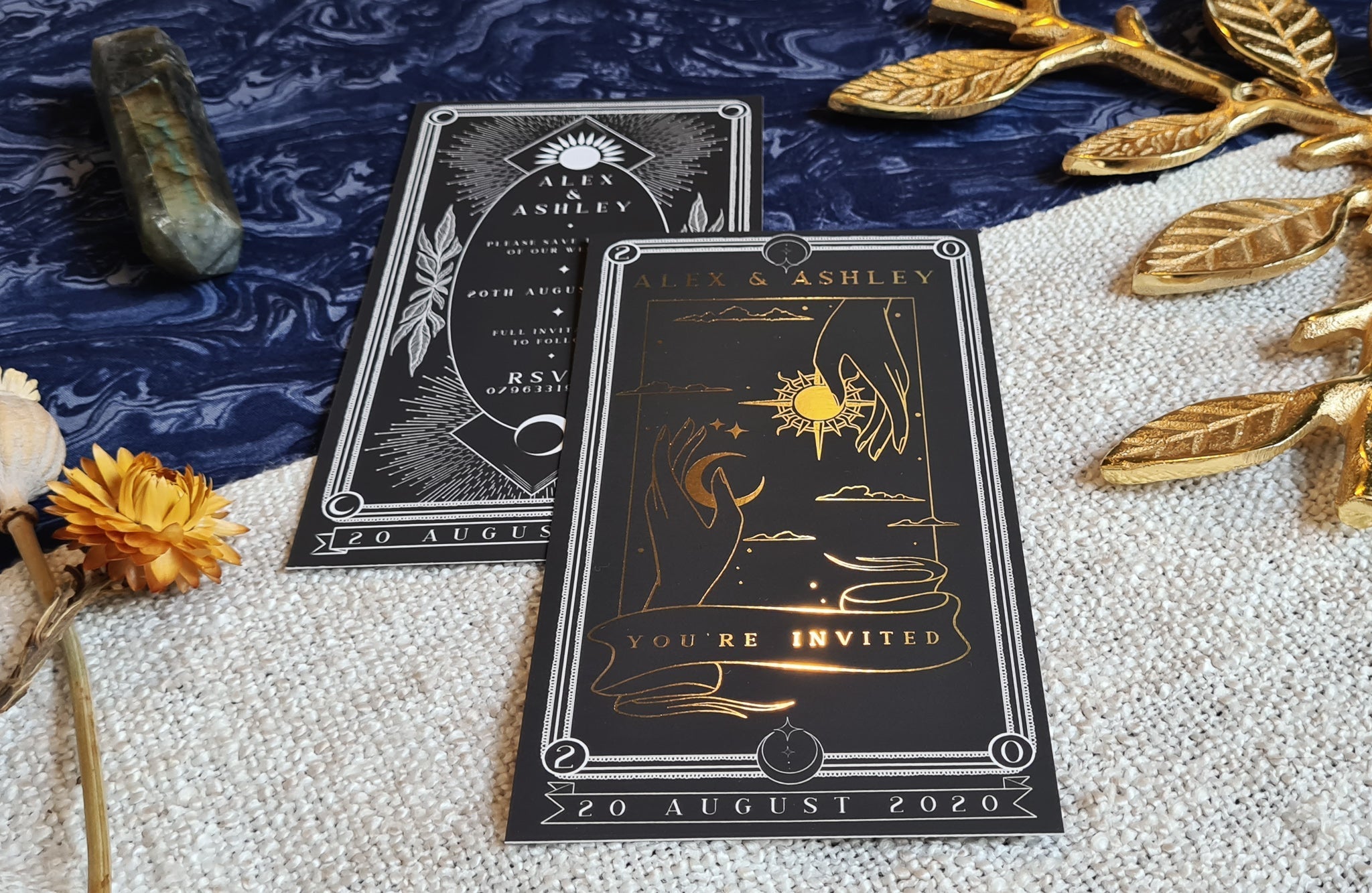 Sun & Moon foiled tarot card save the date with gold foil design and white envelope.