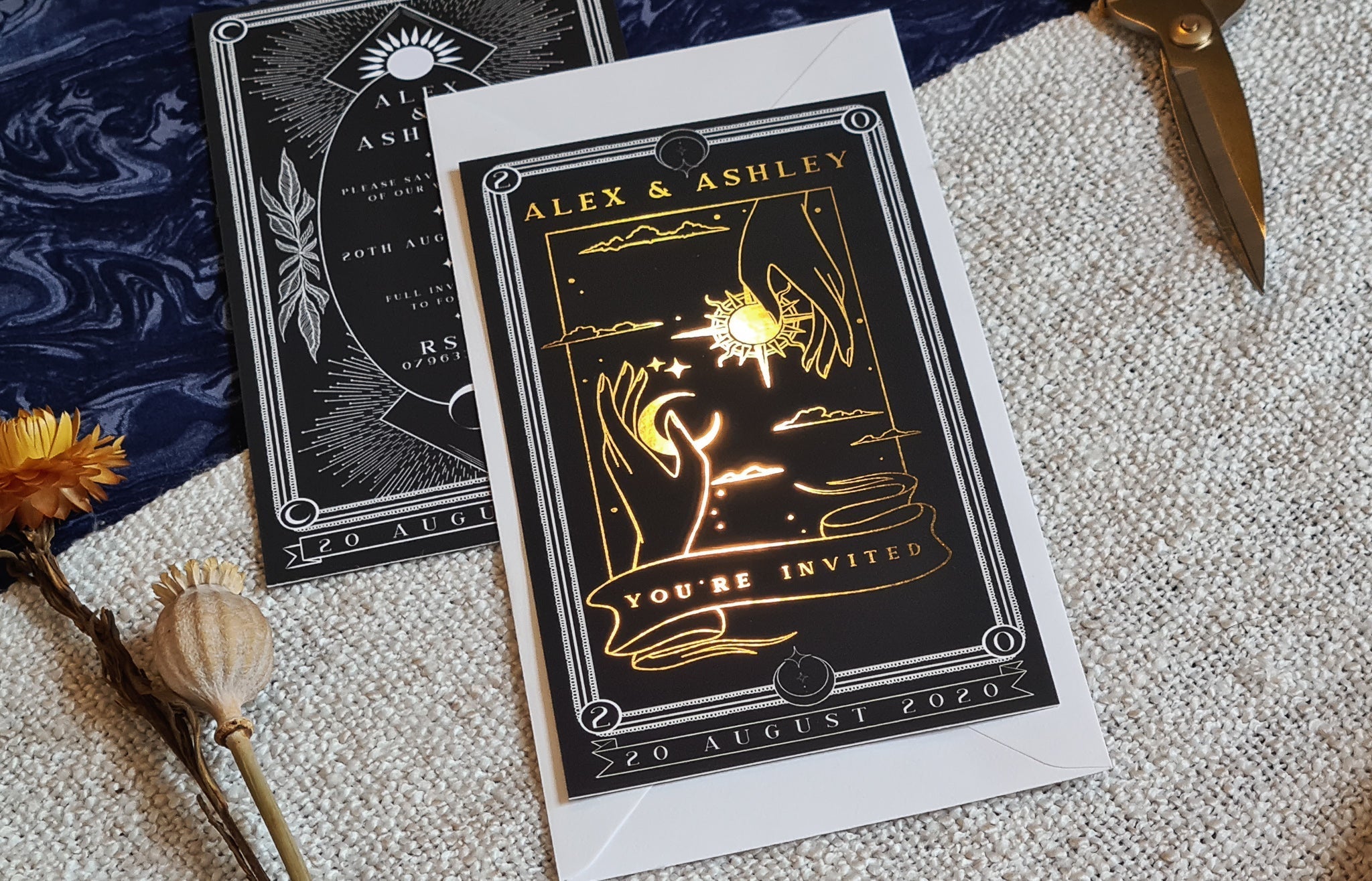 'Sun & Moon' foiled tarot card-themed save the date with gold details and customizable colors.