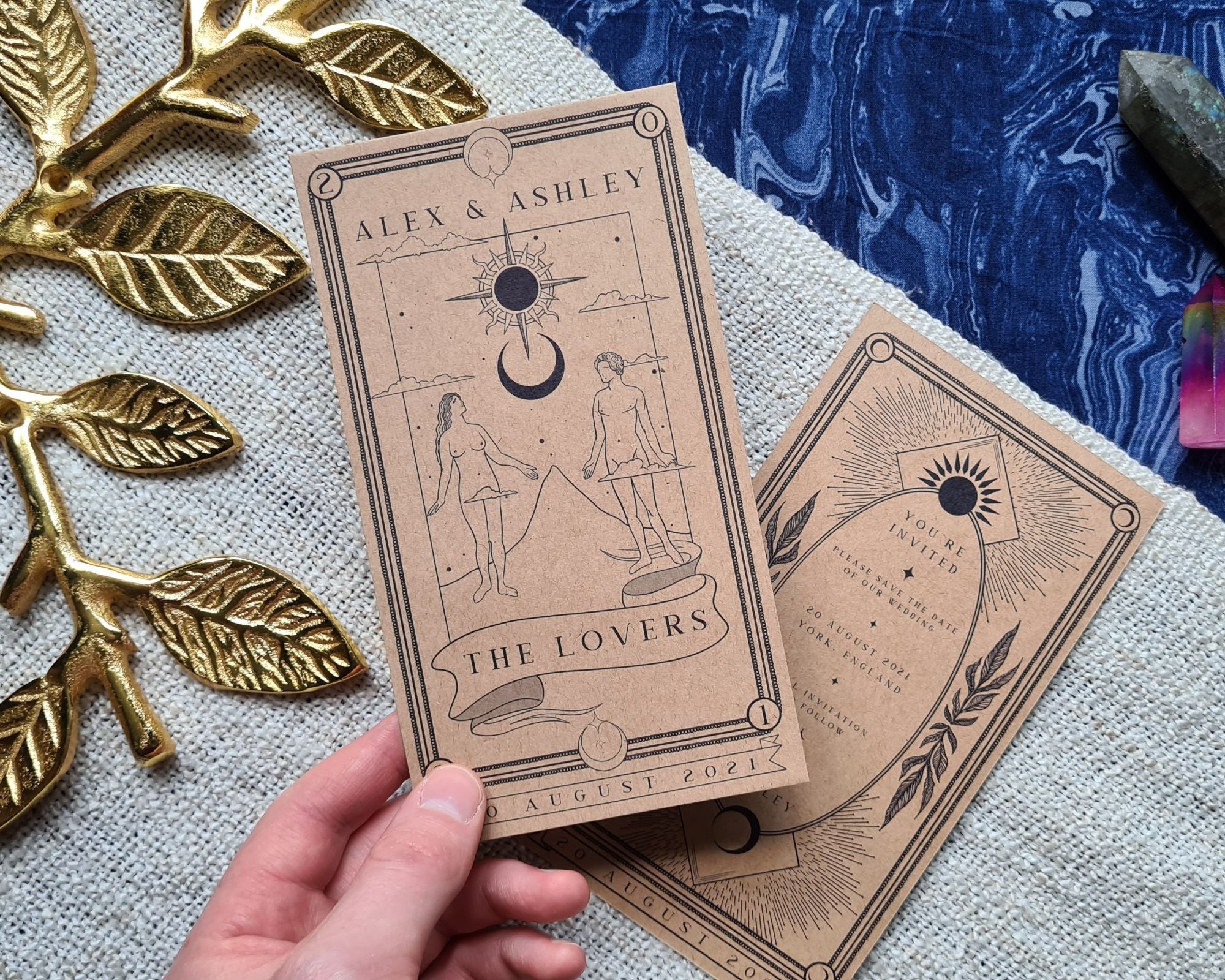 Lovers' Tarot Save The Date Card with vintage design and white envelope.
