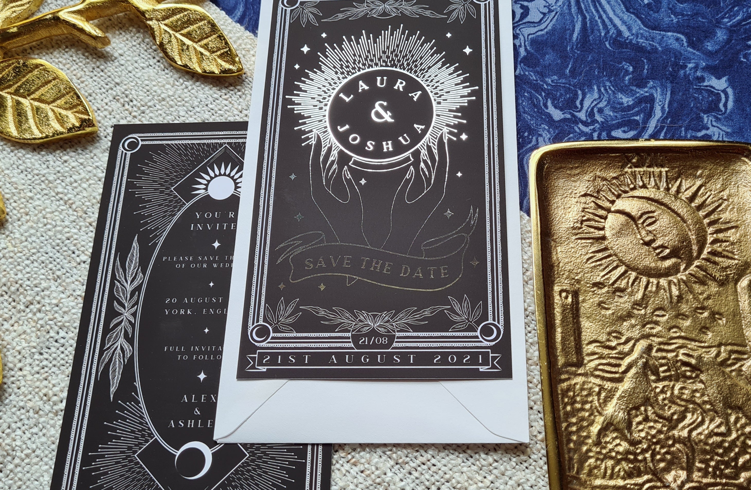 'Crystal Ball' Foiled Tarot Card Save The Date with elegant design and mystical touch on table with golden ornament.