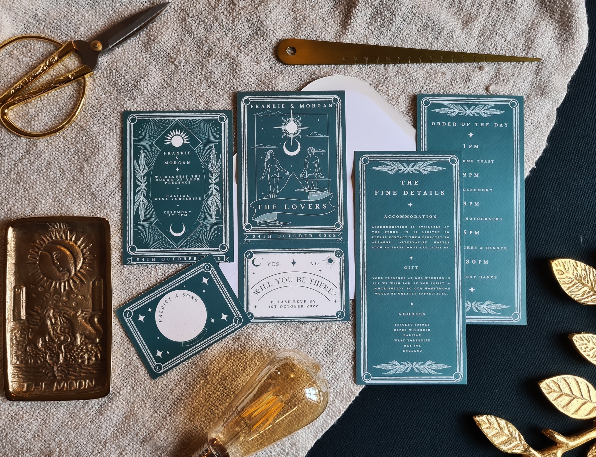 The Lovers Tarot Full Invitation with RSVP set featuring green tarot-themed cards, white envelopes, and decorative elements.