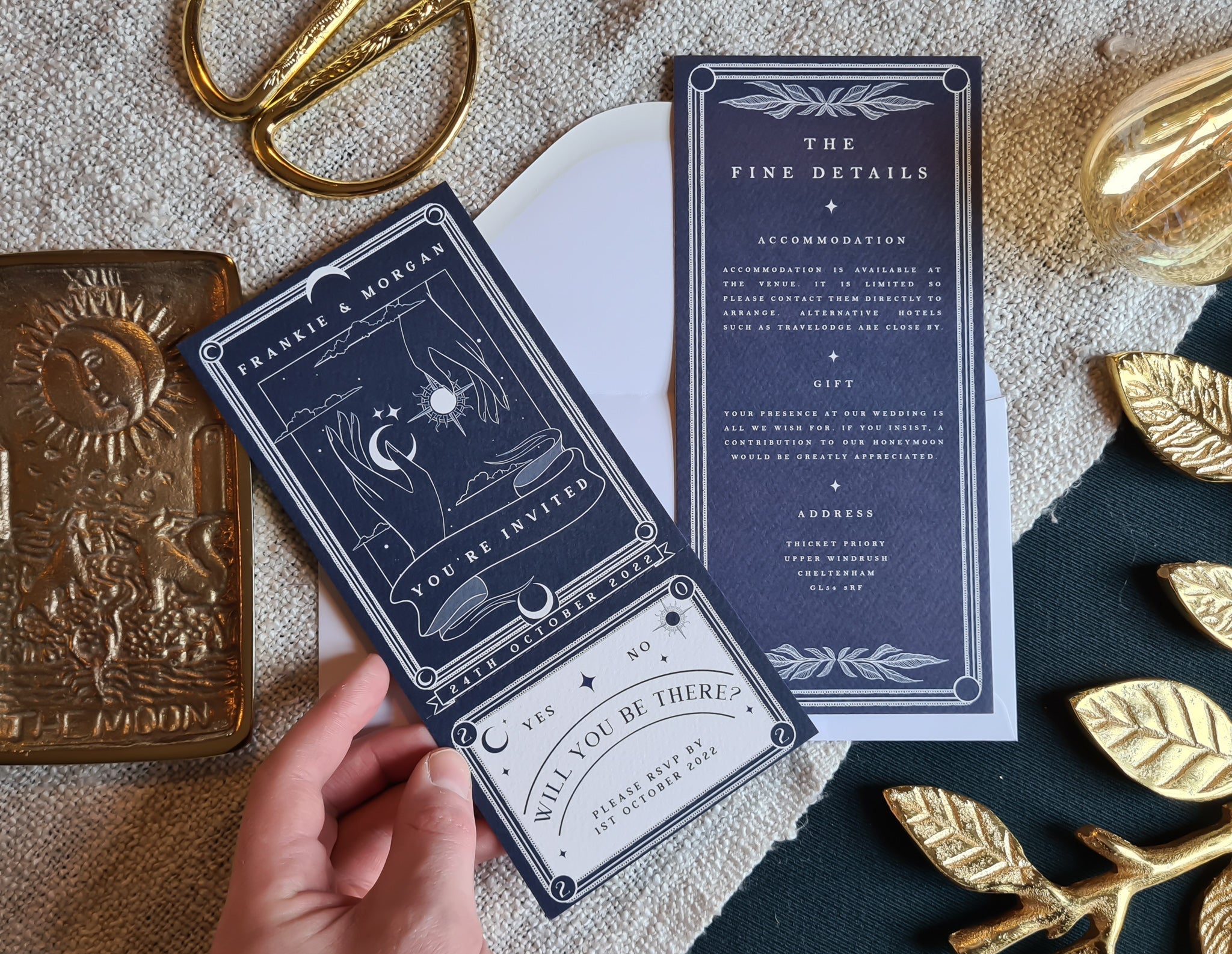 Sun & Moon Tarot Full Invitation with RSVP on textured surface, featuring dark elegant design and white envelope.