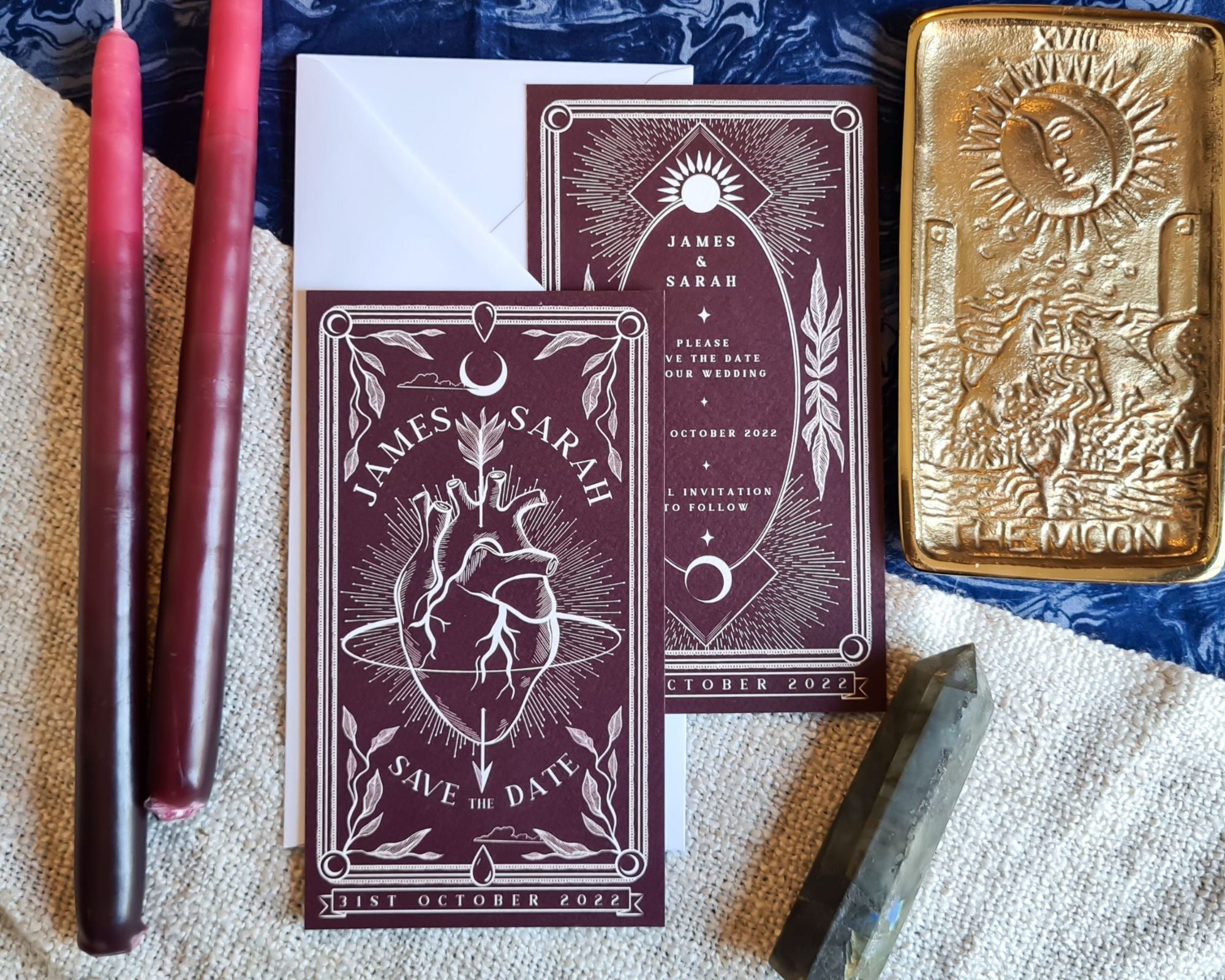 Bleeding Heart Tarot Save The Date card with white envelope, burgundy color and tarot design.