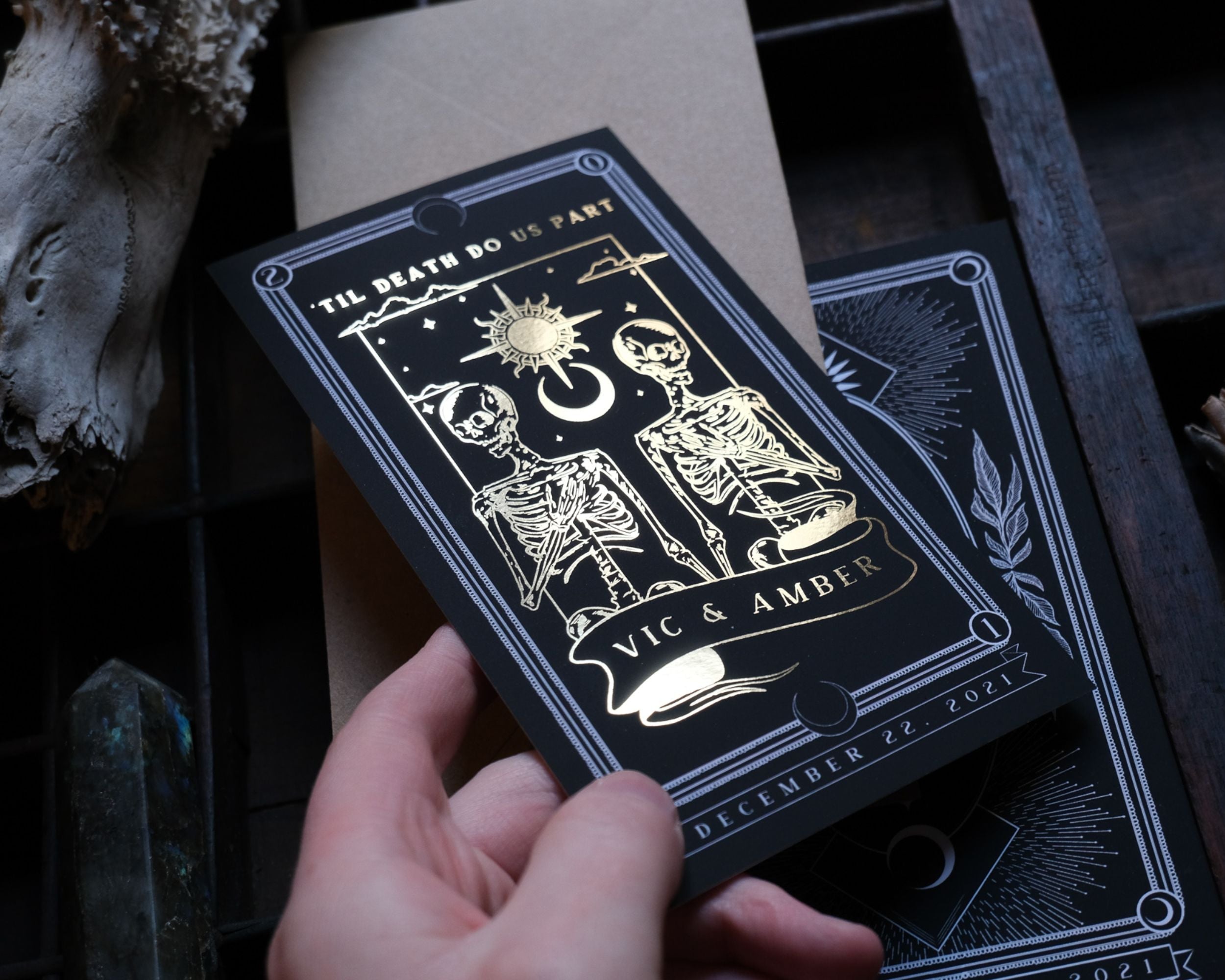 'Til Death Do Us Part' foiled save the date card featuring gothic tarot design with gold foil detailing.