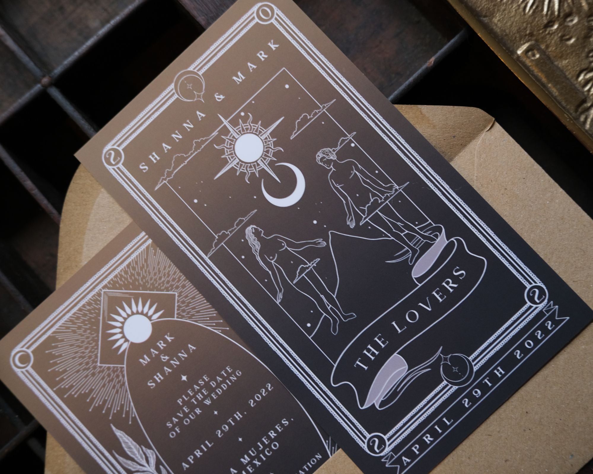 Lovers' Tarot Save The Date card with artistic design and personalized details, includes white envelopes.
