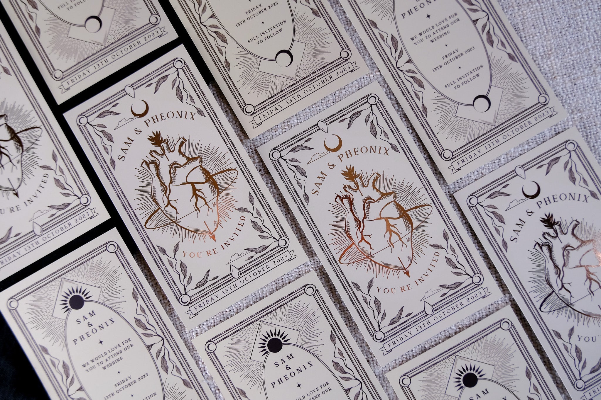 Elegant 'The Bleeding Heart' foiled tarot card save the date with luxurious detailing.