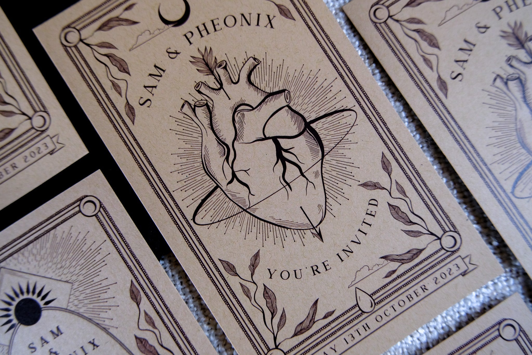 Bleeding Heart Tarot Save The Date card with heart illustration, customizable colors, and white envelope.