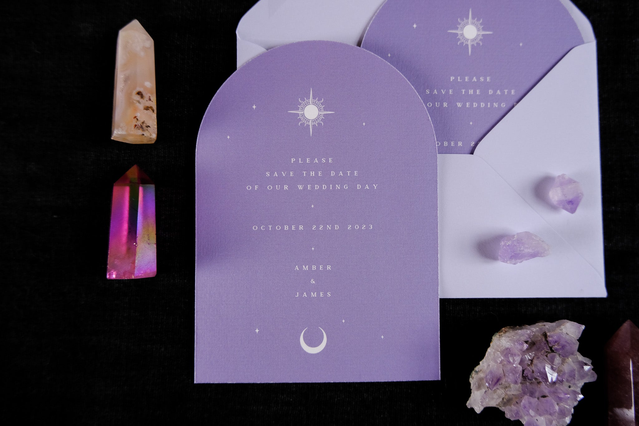 Lover Tarot Arched Save The Date Card with celestial design, set among crystals, featuring elegant typography on matte card.