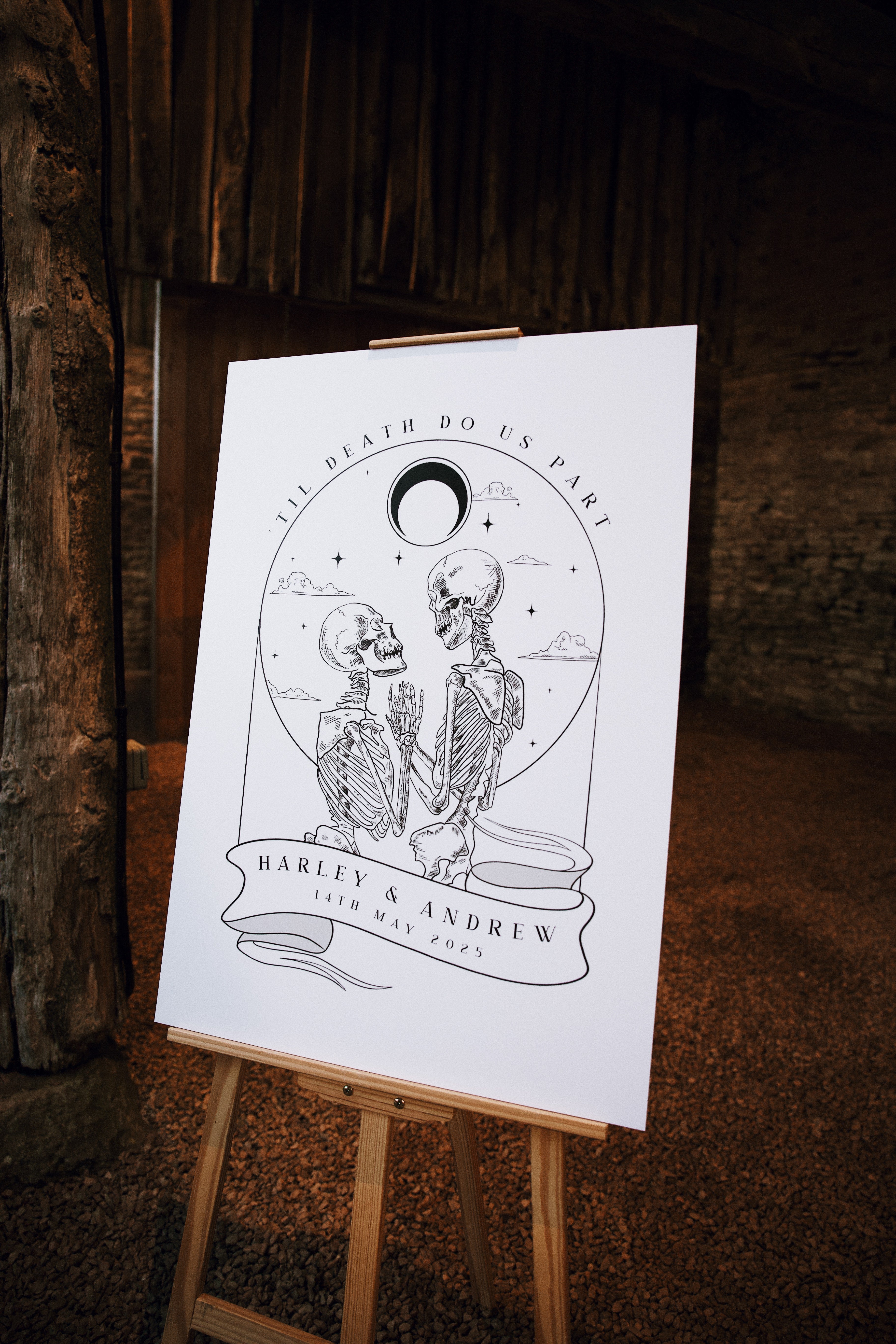 Luxury gothic wedding welcome sign featuring two skeletons beneath a crescent moon, in a mystical tarot-inspired design.
