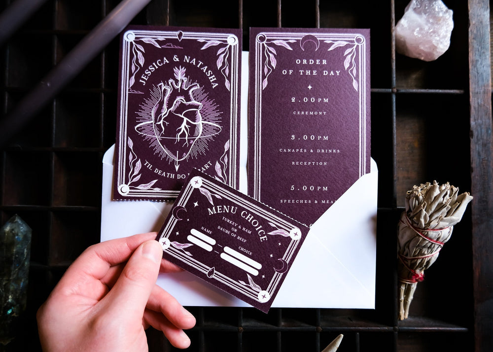 The Bleeding Heart tarot-themed 2-piece wedding invitation suite with anatomical heart illustration and tear-off RSVP section on matte card