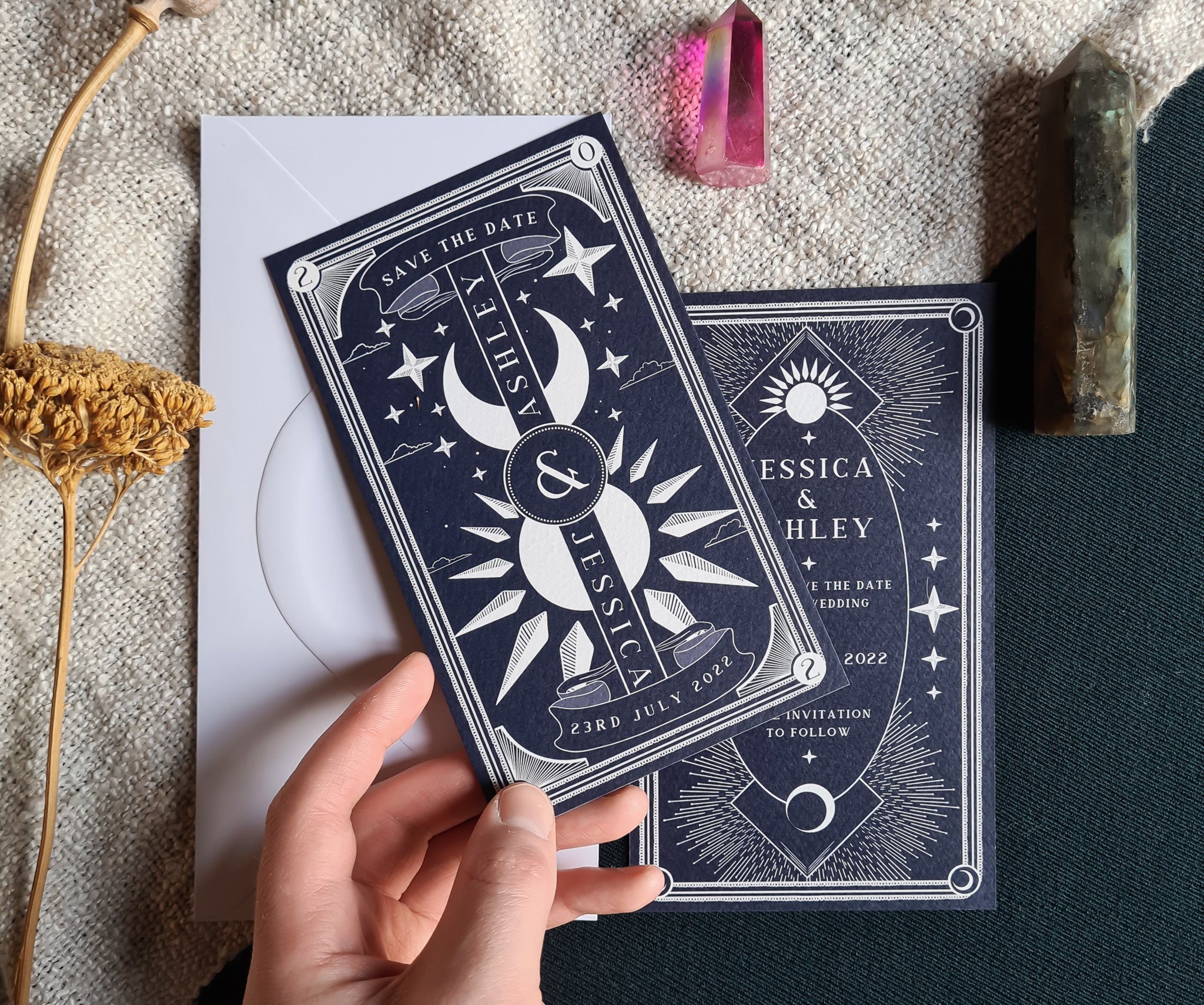 Dusk and Dawn celestial save the date card featuring sun and moon illustration on matte card for bohemian weddings
