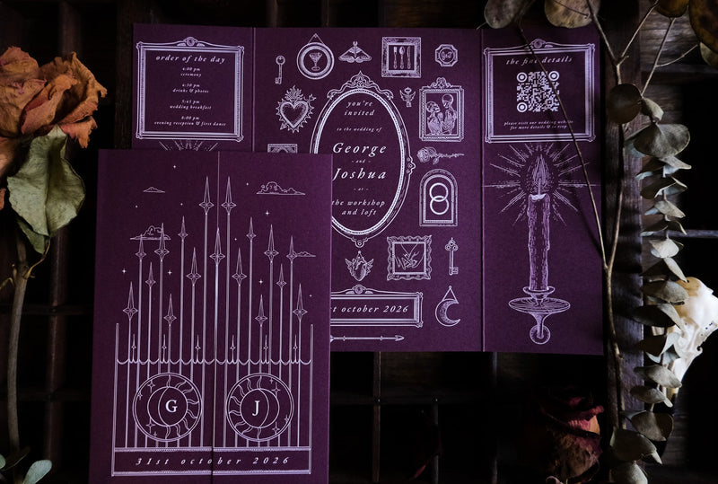 Luxury gothic gatefold wedding invitation in deep purple with mystical white candle, key, and ornate frame motifs on premium card.