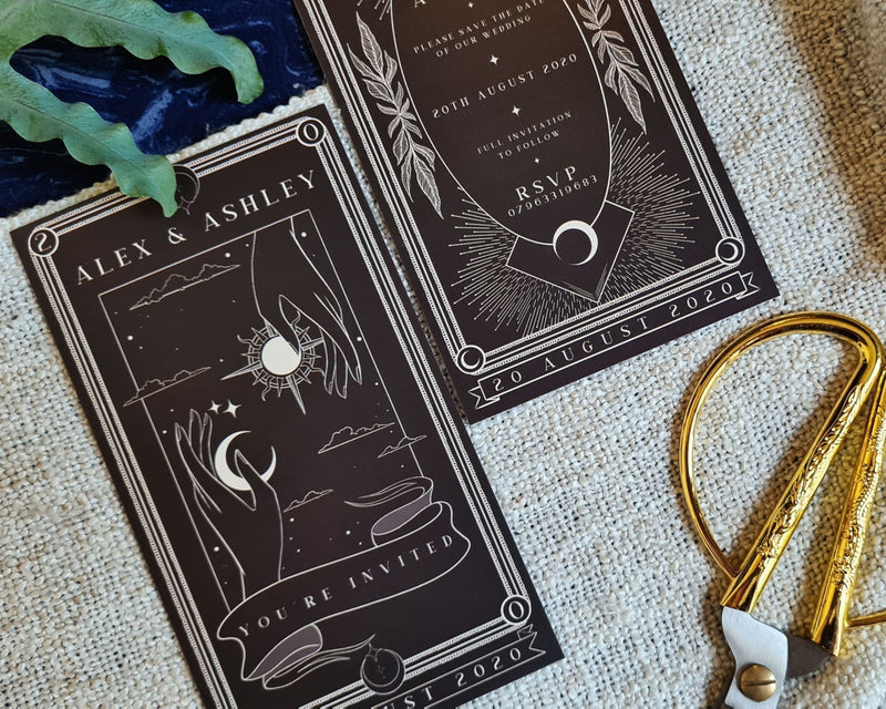 Hand drawn Sun and Moon tarot illustration on celestial save the date card for bohemian weddings