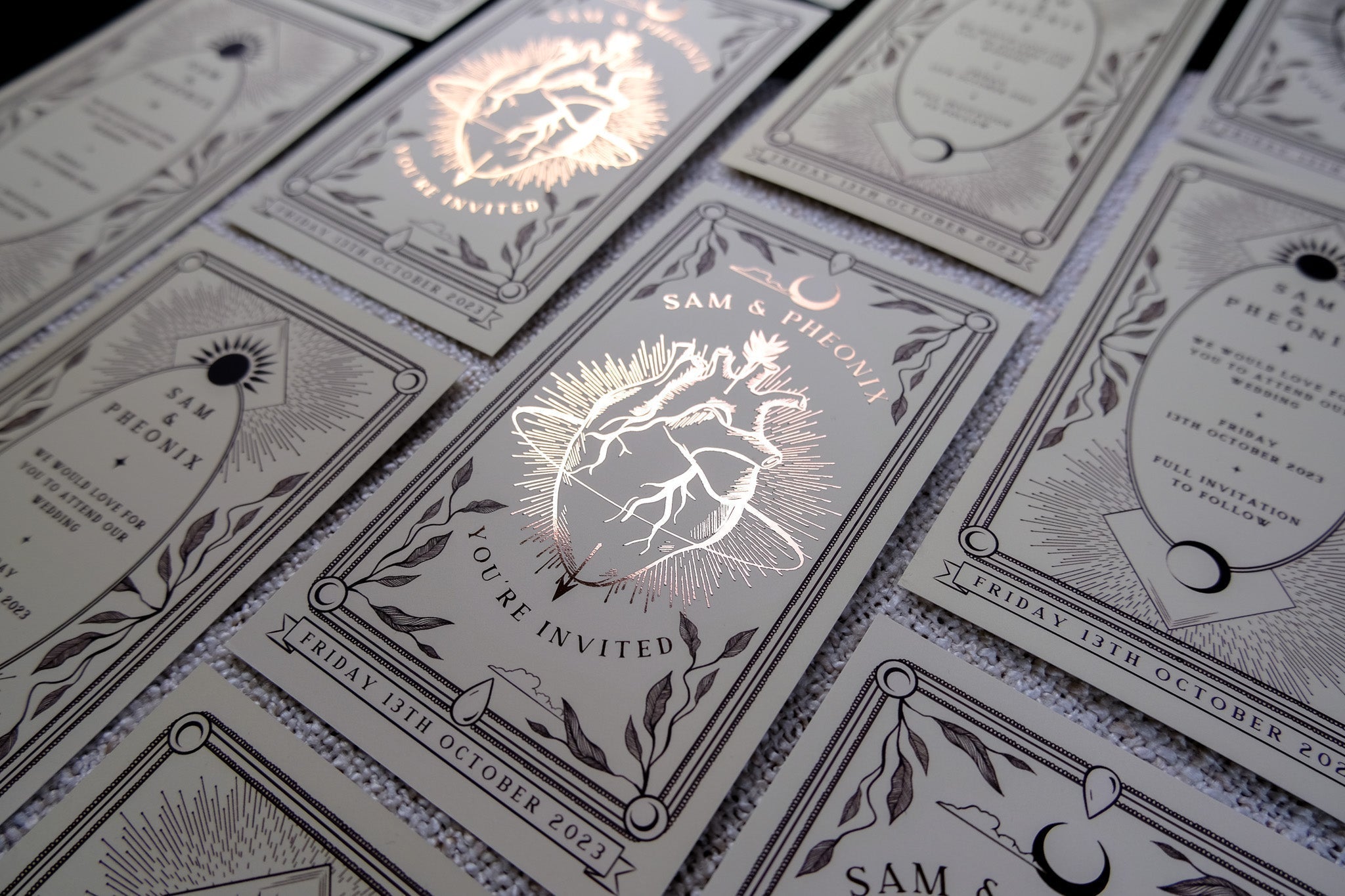 Gothic foiled save the date card featuring an anatomical bleeding heart on velvet soft-touch paper