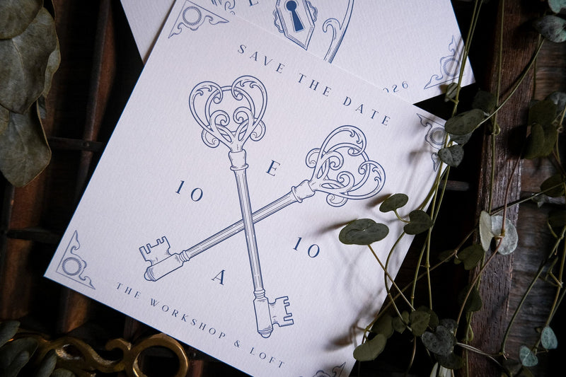 Luxury vintage save the date card with crossed skeleton keys and elegant illustrations on a rustic backdrop, perfect for romantic UK weddings.