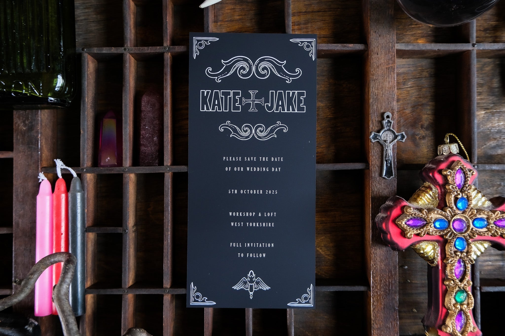 Luxury black gothic wedding stationery with ornate white detailing, dramatic and romantic; perfect for alternative UK weddings.