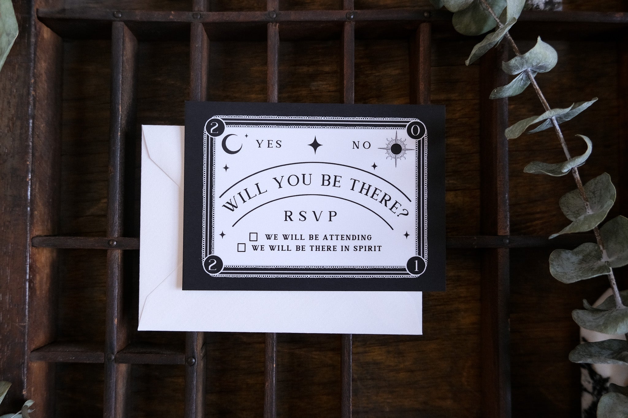 Ouija-inspired gothic wedding RSVP card with spirit board design on premium matte paper