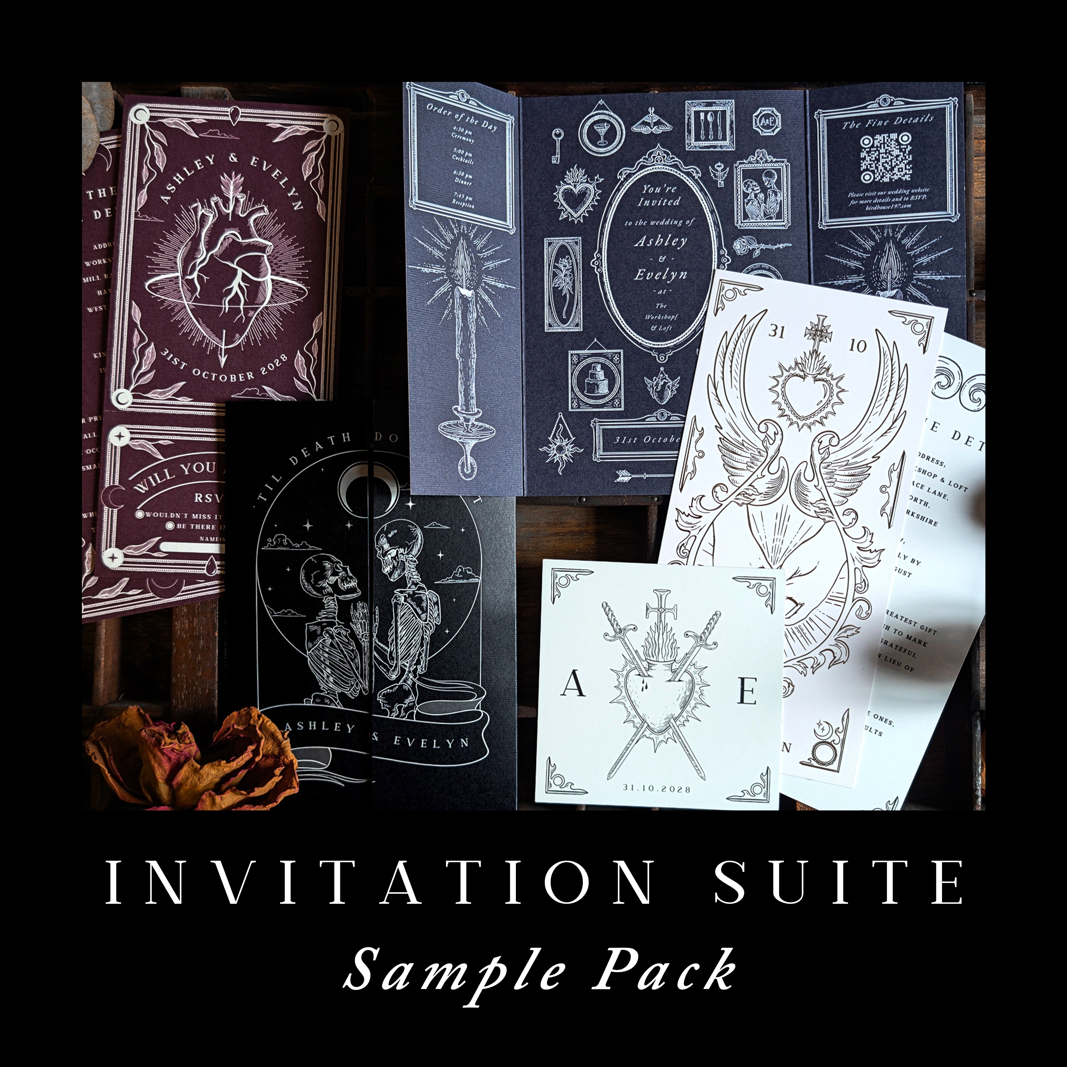 Luxury wedding stationery invitation suite sample pack with a dramatic gothic-inspired design, combining black, white, and deep burgundy tones. Ornate floral detailing and celestial motifs are enhanced by opulent foil accents on premium card stock. The suite is artfully arranged on a rustic wooden surface with a dried rose for a romantic, alternative touch, reflecting sophisticated UK craftsmanship and personalised mystique.