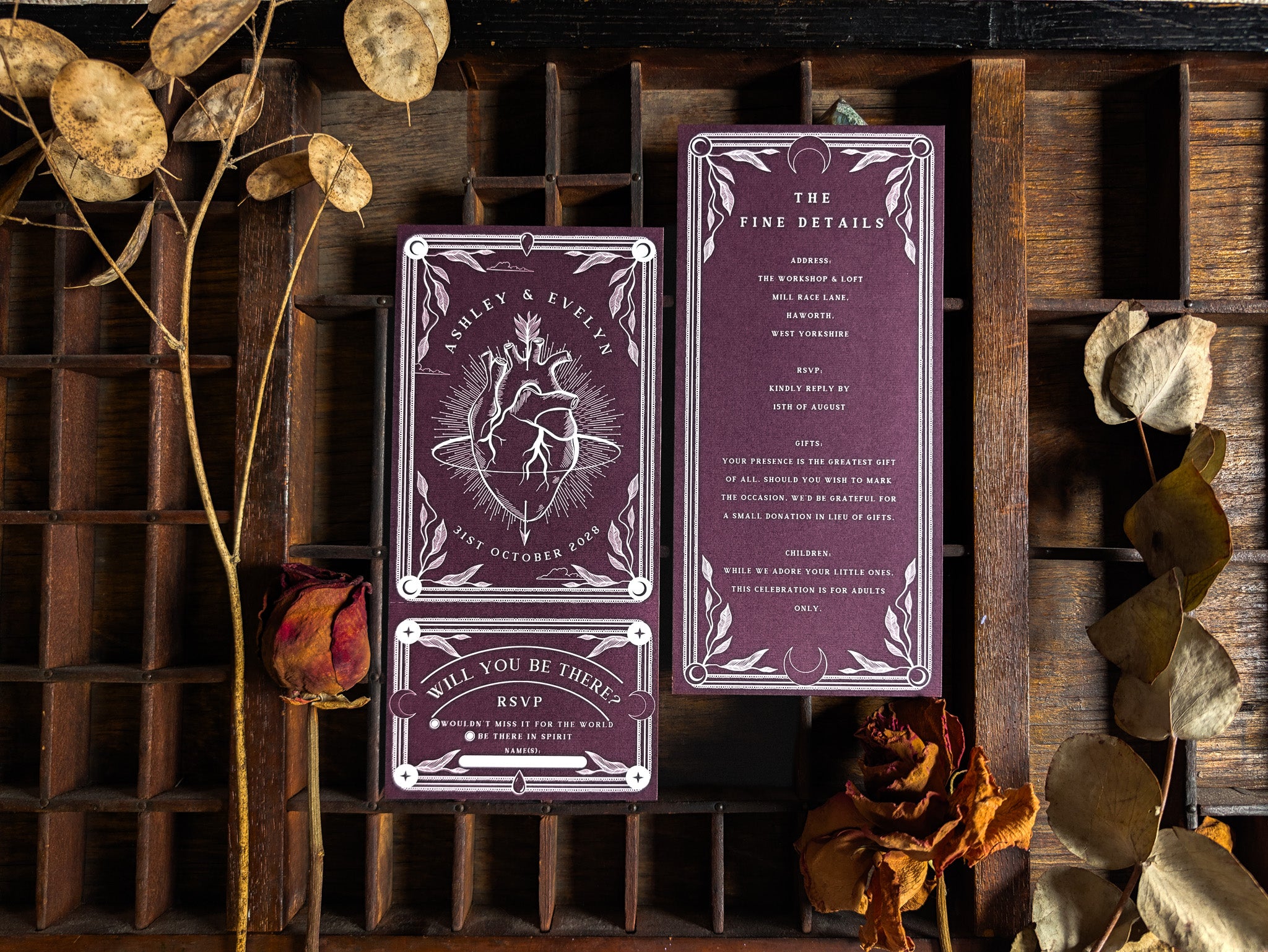 Star-Crossed Lovers invitation suite, foiled gold on off-white card.