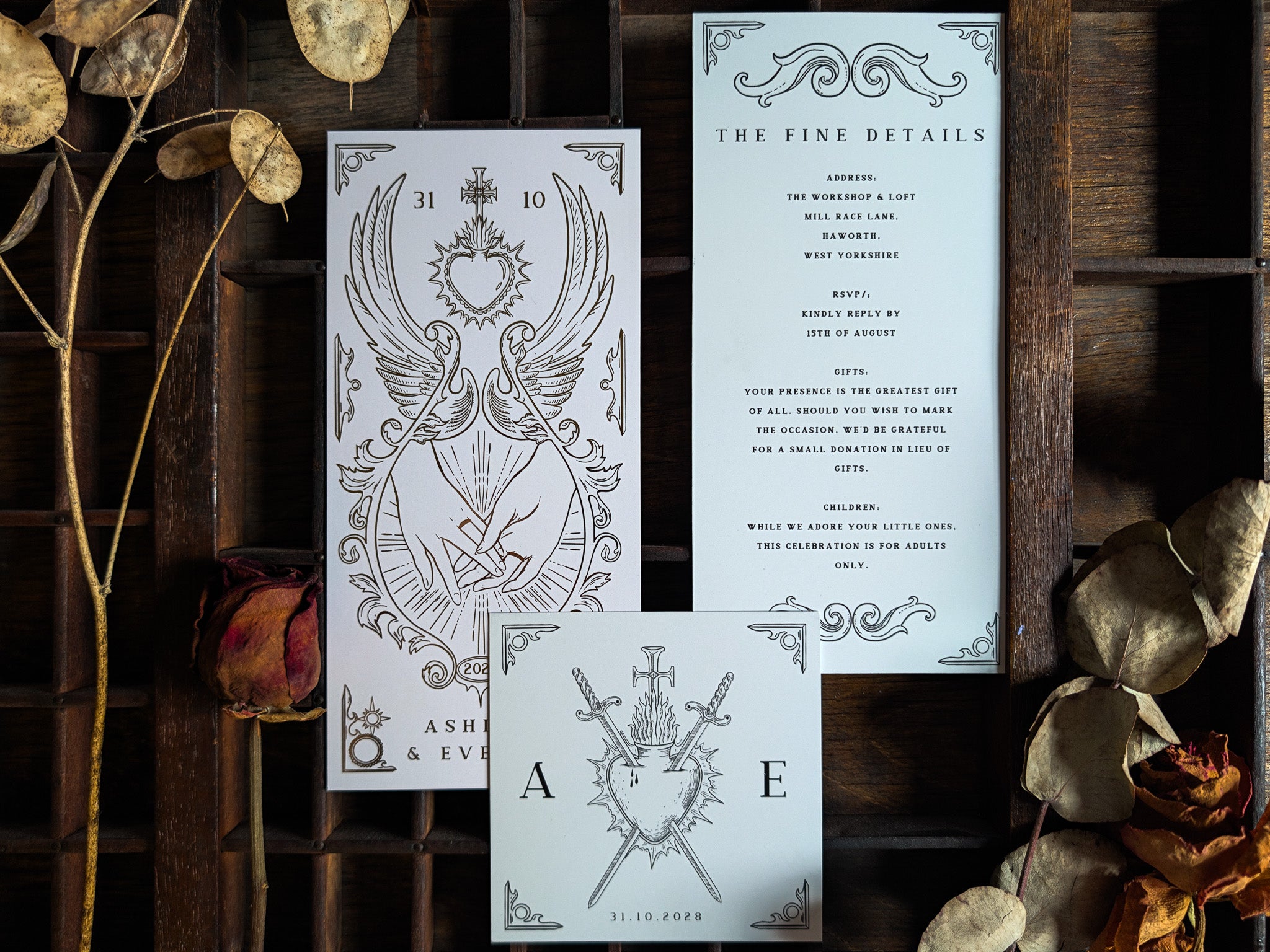 Star-Crossed Lovers invitation suite with crossed swords illustration, gold foiled.