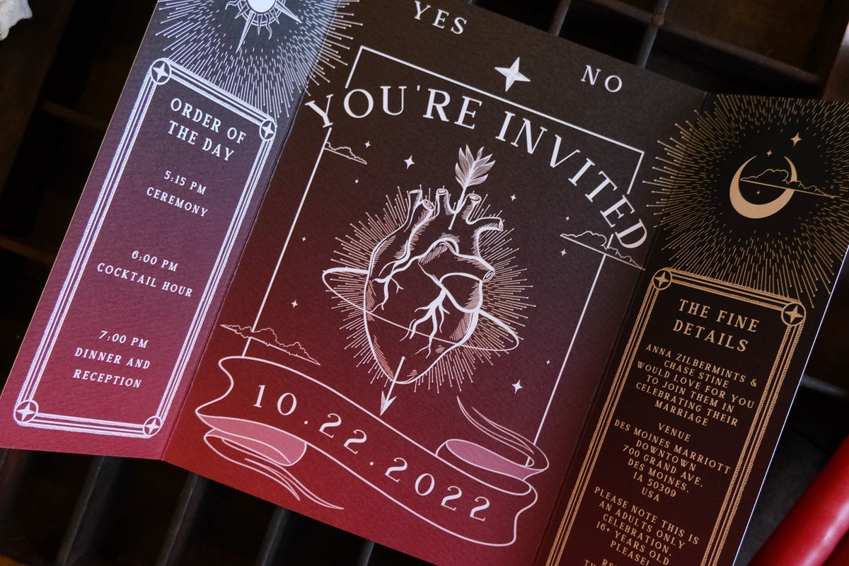 Bleeding Heart gatefold wedding invitation with anatomical heart illustration on matte textured card