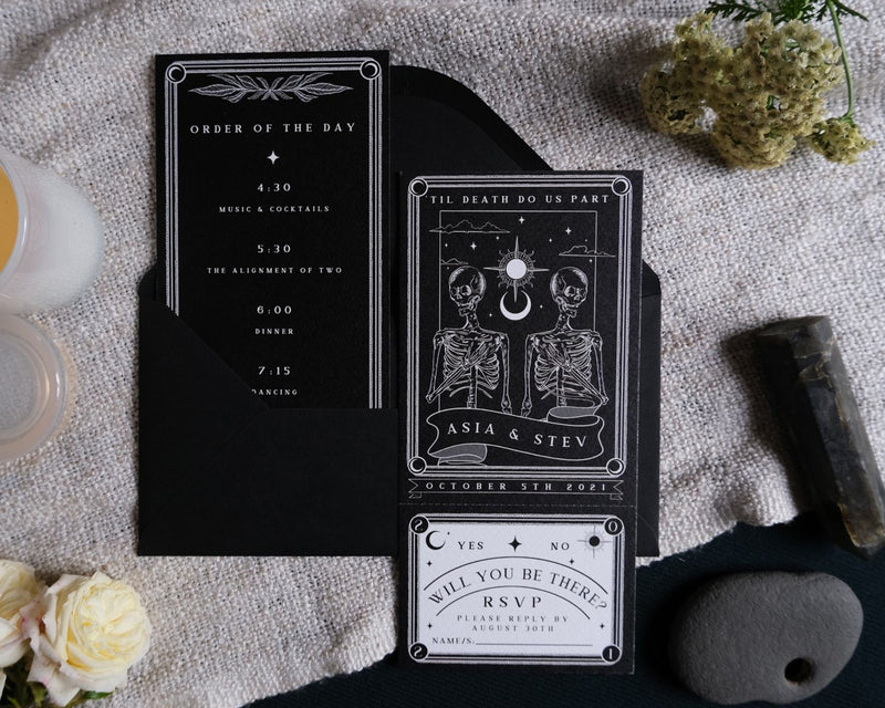 Til Death Do Us Part gothic wedding invitation suite featuring skeleton tarot illustration with tear-off RSVP on matte card