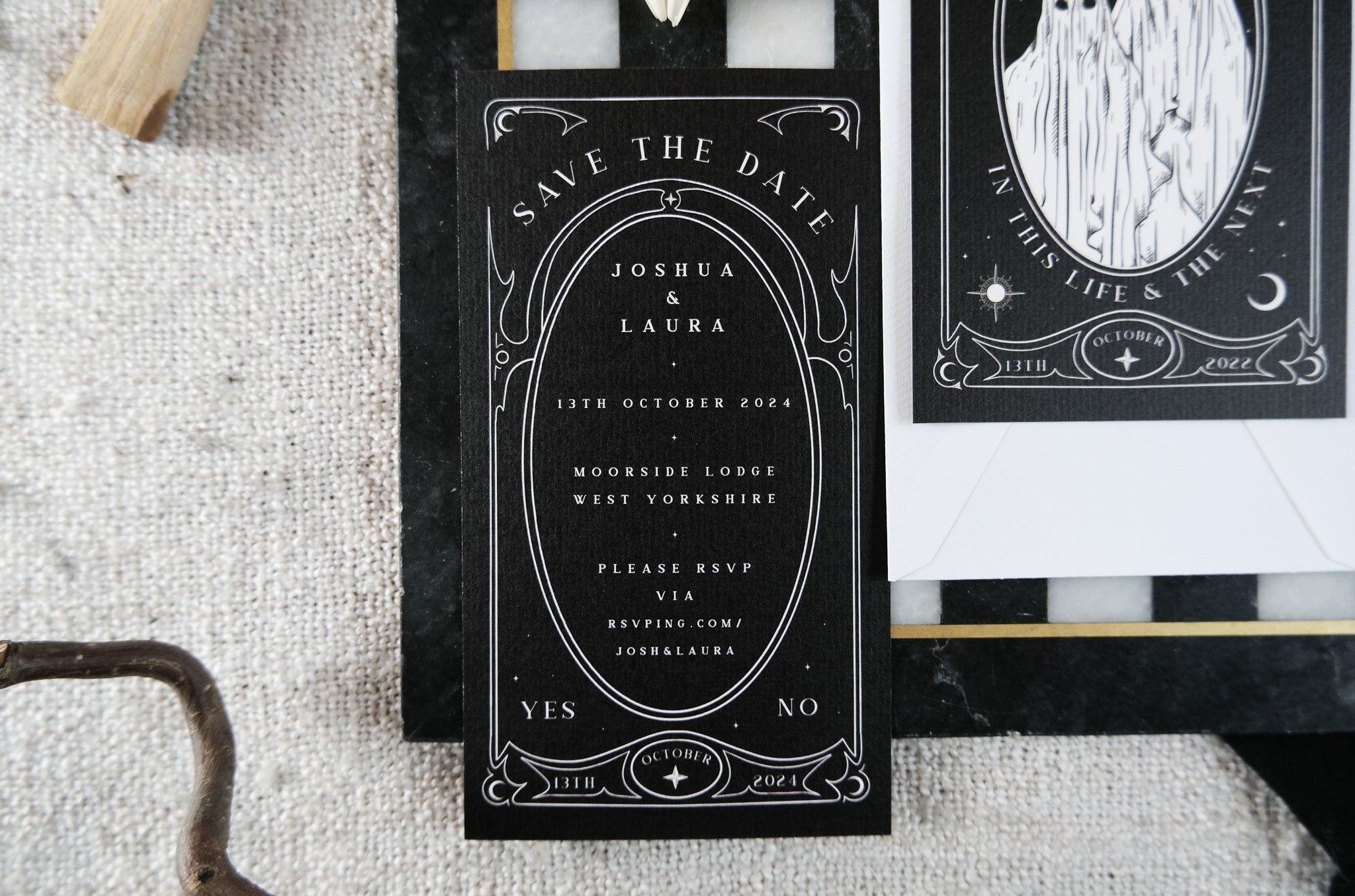 Luxury UK wedding stationery—black, ornate gothic save the date with celestial motifs and vintage tarot-inspired, romantic detailing.