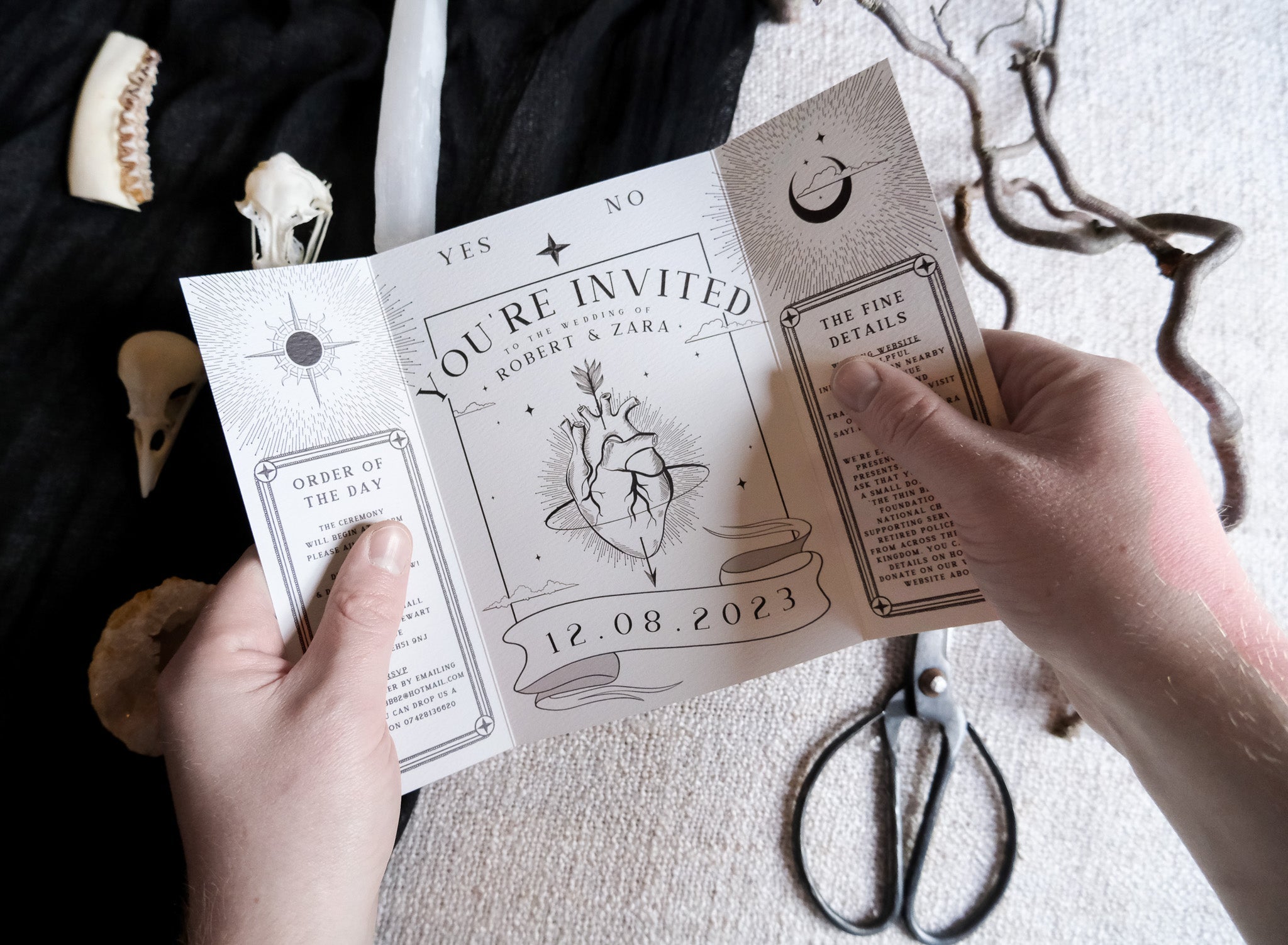 Til Death Do Us Part gatefold wedding invitation with skeleton lovers and bleeding heart gothic design on matte textured card