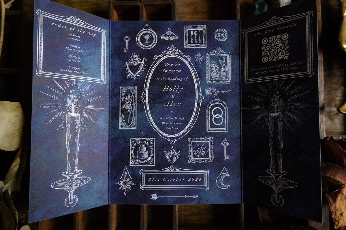 Luxury gatefold wedding invitation in dark gothic style with mystical white illustrations, ideal for dramatic UK wedding stationery.