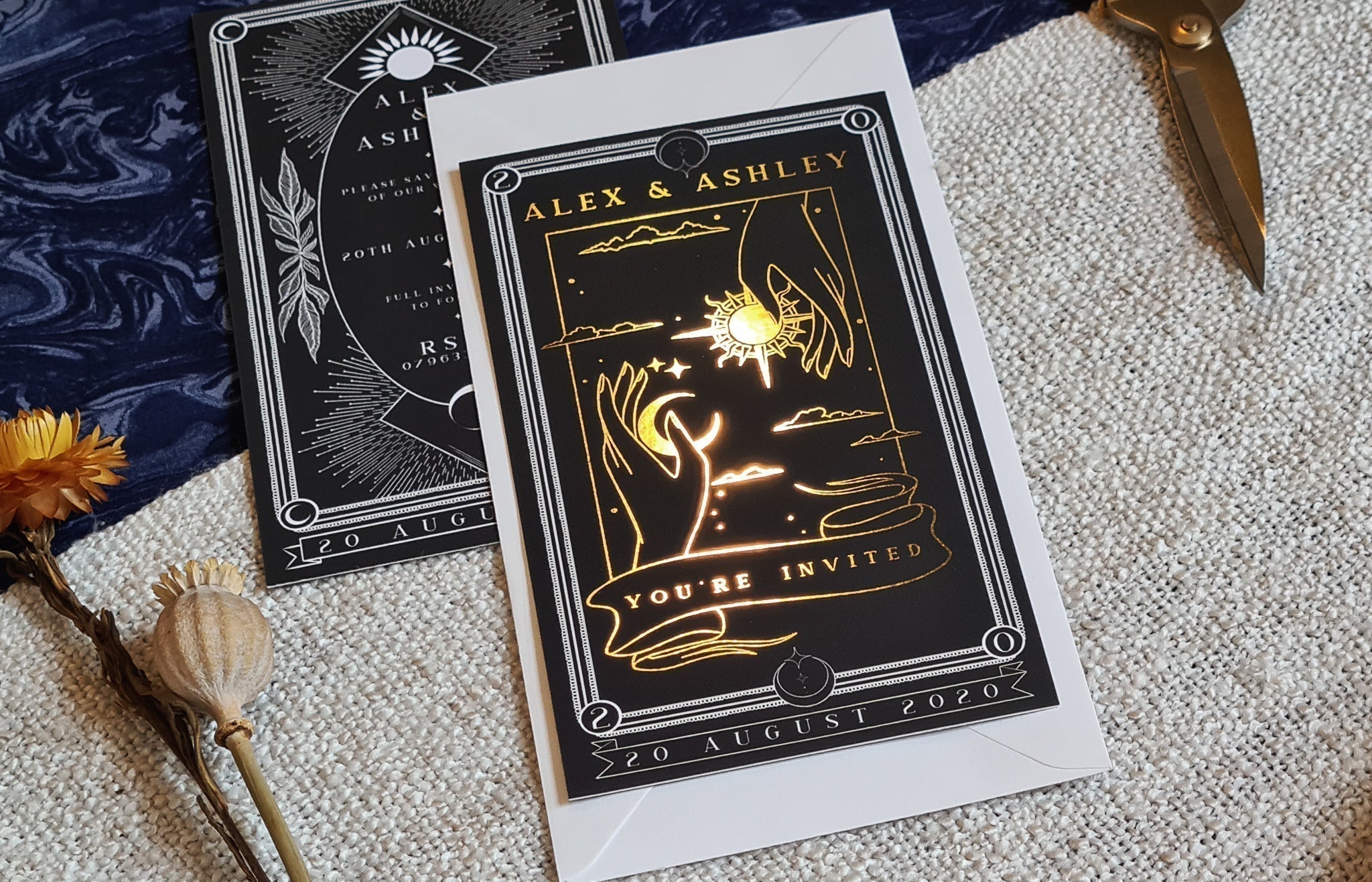Sun and Moon foiled tarot save the date card with celestial sun and moon design on velvet soft-touch card