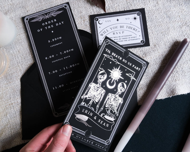 'Til Death Do Us Part' Foiled Tarot Card 3 Piece Invitation Suite with skeleton design, featuring order of the day, RSVP, and customizable details on high-quality velvet paper.